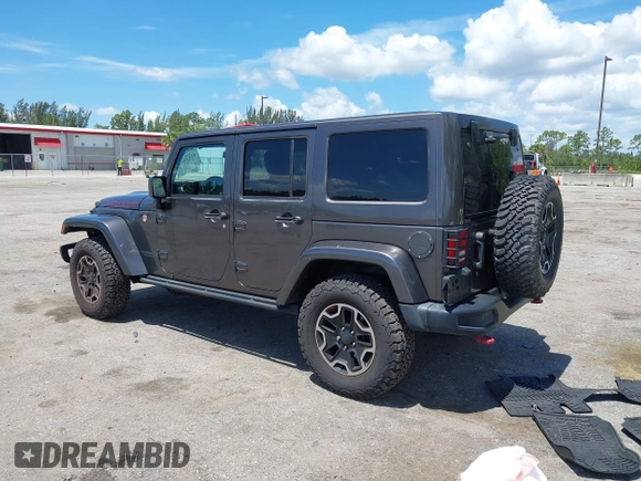 2017 Jeep Wrangler Unlimited Rubicon Recon with VIN 1C4HJWFG2HL560846, listed as a IAAI auction lot 42532745 with 101,285 mi miles and . Bid and sale history available at DreamBid. Image 3.