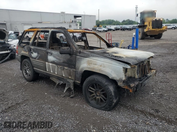 1998 Jeep Grand Cherokee Limited z VIN 1J4GZ88ZXWC255195, wystawiony jako Copart lot #55817705 z przebiegiem Nie podano mil oraz Nie do naprawy • Non repairable. Historia ofert i sprzedaży dostępna na DreamBid. Obrazek 4.