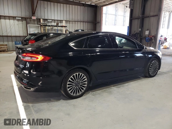 2018 Ford Fusion Titanium с VIN 3FA6P0D9XJR241506, выставлен на аукционе Copart как лот 60736525 с пробегом 109 548 миль миль и Списание • Salvage title. История ставок и продаж доступна на DreamBid. Изображение 3.