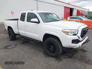 2022 Toyota Tacoma SR with VIN 3TYSX5EN1NT010664, listed as a IAAI auction lot 41642295 with 29,848 mi miles and . Bid and sale history available at DreamBid. Image 1.