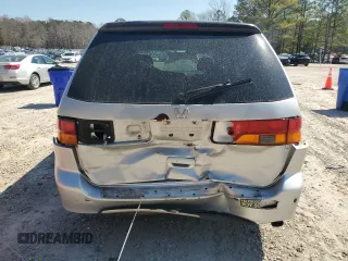 2004 Honda Odyssey EX-L with VIN 5FNRL18974B074613, listed as a Copart auction lot 48924865 with 212,633 mi miles and Salvage Title. Bid and sale history available at DreamBid. Image 6.