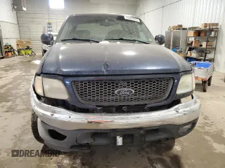 2002 Ford F-150 XLT with VIN 1FTRW08L02KE06257, listed as a Copart auction lot 45004605 with 189,003 mi miles and Salvage Title. Bid and sale history available at carsss.com. Image 5.