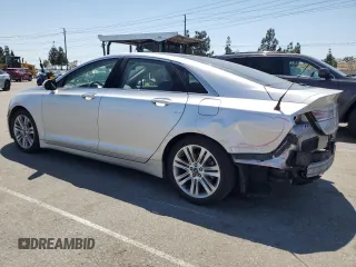 2014 Lincoln MKZ Hybrid with VIN 3LN6L2LU2ER836102, listed as a Copart auction lot 57661075 with 168,275 mi miles and Salvage title. Bid and sale history available at DreamBid. Image 2.