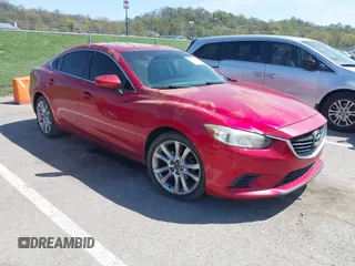 2015 Mazda 6 i Touring with VIN JM1GJ1V58F1185486, listed as a IAAI auction lot 42053968 with 239,811 mi miles. Bid and sale history available at carsss.com. Image 1.
