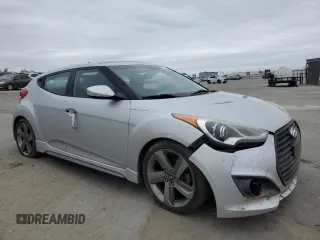 2013 Hyundai Veloster Turbo z VIN KMHTC6AE2DU158240, wystawiony jako Copart lot #54719205 z przebiegiem 147 652 mil mil oraz Szkoda całkowita • Salvage title. Historia ofert i sprzedaży dostępna na DreamBid. Obrazek 4.