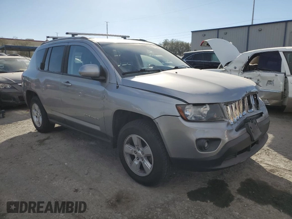 2016 Jeep Compass Latitude with VIN 1C4NJCEA8GD734510, listed as a Copart auction lot 43583605 with 97,604 mi miles and Salvage Title. Bid and sale history available at carsss.com. Image 4.