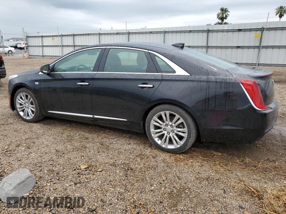 2019 Cadillac XTS Luxury z VIN 2G61M5S3XK9133339, wystawiony jako Copart lot #52651365 z przebiegiem 124 041 mil mil oraz Szkoda całkowita • Salvage title. Historia ofert i sprzedaży dostępna na DreamBid. Obrazek 2.
