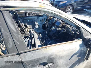2017 Infiniti Q50 Premium z VIN JN1EV7AP7HM740731, wystawiony jako IAAI lot #41704342 z przebiegiem Nie podano mil oraz . Historia ofert i sprzedaży dostępna na DreamBid. Obrazek 5.