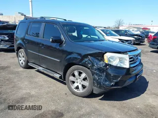 2014 Honda Pilot Touring with VIN 5FNYF4H94EB049495, listed as a IAAI auction lot 41937134 with 149,445 mi miles and . Bid and sale history available at carsss.com. Image 1.