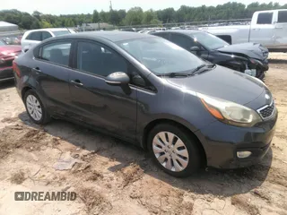 2013 Kia Rio EX with VIN KNADN4A37D6215877, listed as a IAAI auction lot 42413575 with 191,579 mi miles and . Bid and sale history available at DreamBid. Image 1.