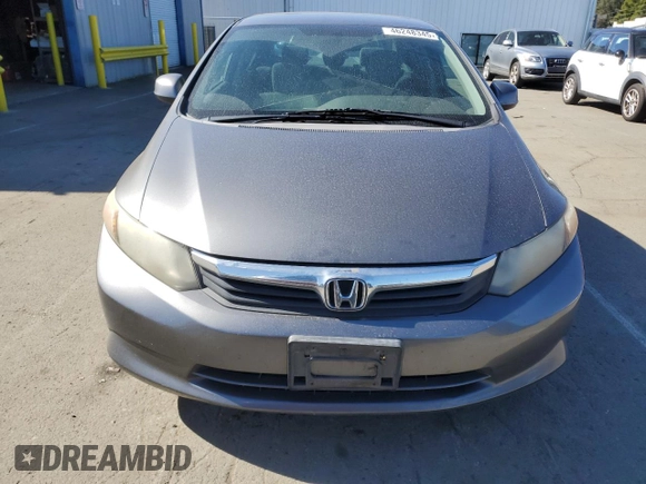 2012 Honda Civic LX z VIN 2HGFB2F53CH324712, wystawiony jako Copart lot #46248345 z przebiegiem 316 459 mil mil oraz Szkoda całkowita • Salvage title. Historia ofert i sprzedaży dostępna na DreamBid. Obrazek 5.