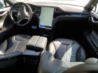 2014 Tesla Model S 60 with VIN 5YJSA1H10EFP58650, listed as a Copart auction lot 45325375 with 105,603 mi miles and Salvage Title. Bid and sale history available at DreamBid. Image 8.