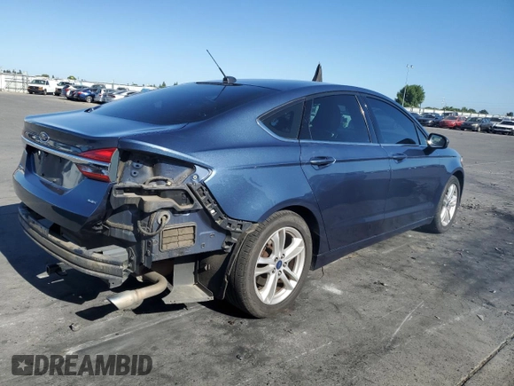 2018 Ford Fusion SE z VIN 3FA6P0H7XJR110391, wystawiony jako Copart lot #58069735 z przebiegiem 168 222 mil mil oraz Szkoda całkowita • Salvage title. Historia ofert i sprzedaży dostępna na DreamBid. Obrazek 3.