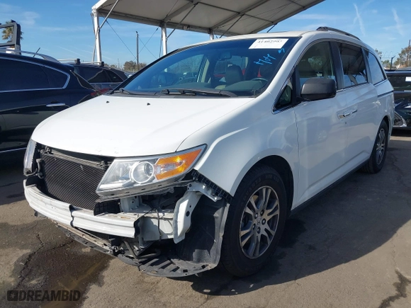 2011 Honda Odyssey EX-L with VIN 5FNRL5H67BB007777, listed as a IAAI auction lot 41402903 with 210,921 mi miles. Bid and sale history available at carsss.com. Image 2.
