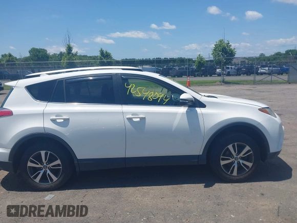 2016 Toyota RAV4 XLE with VIN JTMRFREV0GJ073114, listed as a IAAI auction lot 42548094 with 119,431 mi miles and . Bid and sale history available at DreamBid. Image 13.