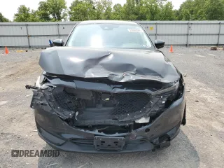 2019 Mazda CX-5 Grand Touring with VIN JM3KFBDM2K0569829, listed as a Copart auction lot 59060965 with 99,359 mi miles and Salvage title. Bid and sale history available at DreamBid. Image 5.