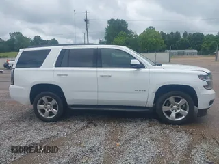 2017 Chevrolet Tahoe LS with VIN 1GNSCAKC7HR342637, listed as a IAAI auction lot 42335097 with 149,736 mi miles and . Bid and sale history available at DreamBid. Image 13.