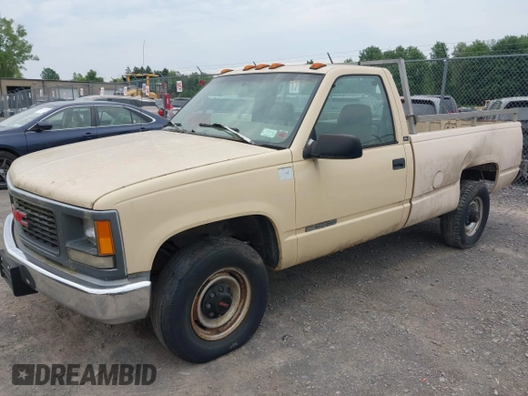 1995 GMC Sierra 3500 z VIN 1GTGC34K2SE536473, wystawiony jako IAAI lot #42487739 z przebiegiem 81 910 mil mil oraz . Historia ofert i sprzedaży dostępna na DreamBid. Obrazek 2.