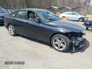 2014 BMW 3 Series GT 335i Gran Turismo xDrive with VIN WBA3X9C51ED867683, listed as a IAAI auction lot 41920931 with 121,618 mi miles and . Bid and sale history available at DreamBid. Image 1.