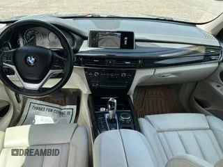2016 BMW X5 xDrive40e z VIN 5UXKT0C52G0F74828, wystawiony jako Copart lot #58977975 z przebiegiem 122 045 mil mil oraz Tytuł czysty. Historia ofert i sprzedaży dostępna na DreamBid. Obrazek 9.
