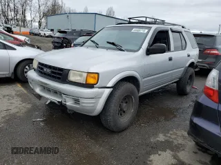 1998 Isuzu Rodeo S z VIN 4S2CK58W1W4327395, wystawiony jako Copart lot #44400715 z przebiegiem 193 659 mil mil oraz Szkoda całkowita • Salvage title. Historia ofert i sprzedaży dostępna na DreamBid. Obrazek 1.