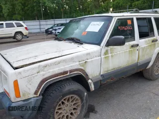 1999 Jeep Cherokee Sport z VIN 1J4FF68S0XL663735, wystawiony jako IAAI lot #42463562 z przebiegiem Nie podano mil oraz . Historia ofert i sprzedaży dostępna na DreamBid. Obrazek 6.