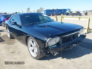 2014 Dodge Challenger R/T z VIN 2C3CDYBT2EH313789, wystawiony jako IAAI lot #42020945 z przebiegiem 182 788 mil mil oraz . Historia ofert i sprzedaży dostępna na DreamBid. Obrazek 1.