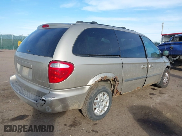 2003 Dodge Grand Caravan with VIN 2D4GP44323R262041, listed as a IAAI auction lot 41745245 with 171,935 mi miles and . Bid and sale history available at DreamBid. Image 4.