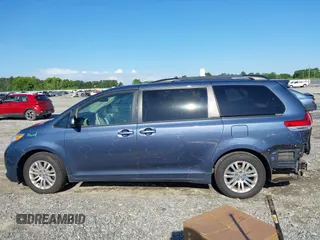 2014 Toyota Sienna XLE z VIN 5TDYK3DC9ES526117, wystawiony jako IAAI lot #42247546 z przebiegiem 119 096 mil mil oraz . Historia ofert i sprzedaży dostępna na DreamBid. Obrazek 14.