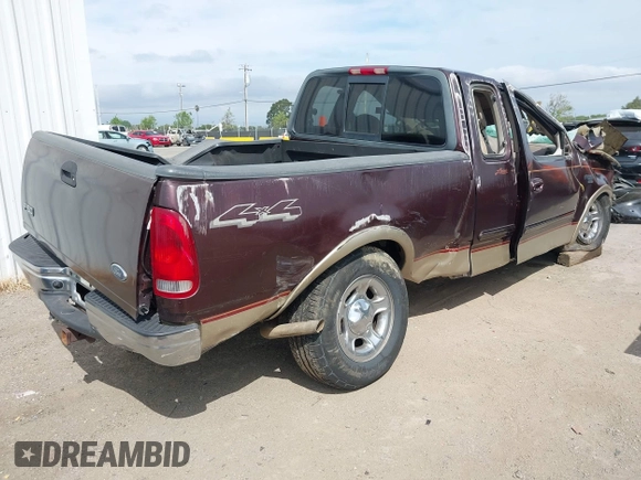 2000 Ford F-150 XL with VIN 1FTRX18L2YNB87229, listed as a IAAI auction lot 42041368 with 84,956 mi miles. Bid and sale history available at carsss.com. Image 4.