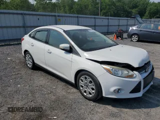 2012 Ford Focus SE with VIN 1FAHP3F21CL445400, listed as a Copart auction lot 58512535 with 142,515 mi miles and Salvage title. Bid and sale history available at DreamBid. Image 4.