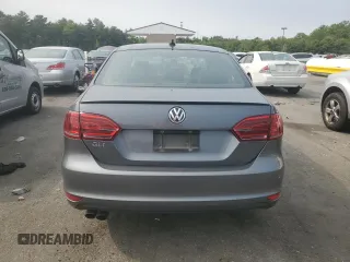 2014 Volkswagen Jetta GLI with VIN 3VW4T7AJ3EM352712, listed as a Copart auction lot 59582825 with 145,765 mi miles and Salvage title. Bid and sale history available at DreamBid. Image 6.