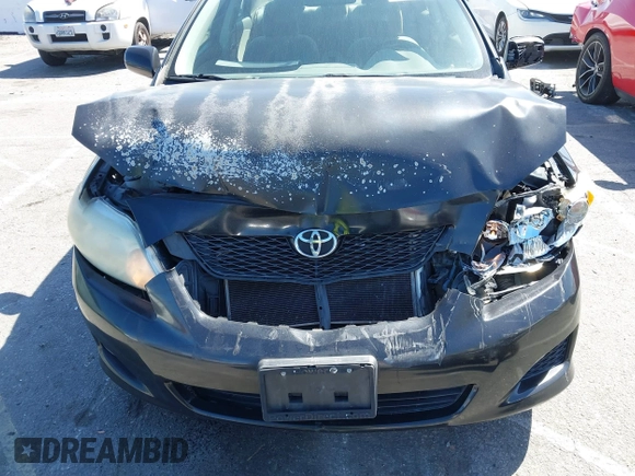 2009 Toyota Corolla with VIN JTDBL40E199094885, listed as a IAAI auction lot 41840789 with 106,498 mi miles. Bid and sale history available at carsss.com. Image 6.