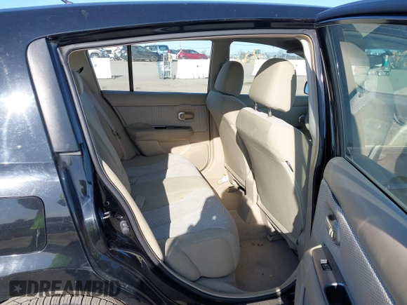 2009 Nissan Versa 1.8 SL with VIN 3N1BC13E79L406521, listed as a IAAI auction lot 41778840 with 93,070 mi miles. Bid and sale history available at carsss.com. Image 8.