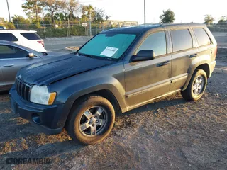 2007 Jeep Grand Cherokee Laredo with VIN 1J8GS48K17C655999, listed as a IAAI auction lot 41590500 with 290,695 mi miles. Bid and sale history available at carsss.com. Image 2.