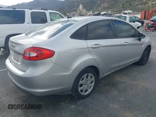 2012 Ford Fiesta SE with VIN 3FADP4BJ3CM106380, listed as a IAAI auction lot 42121786 with 81,613 mi miles. Bid and sale history available at carsss.com. Image 4.