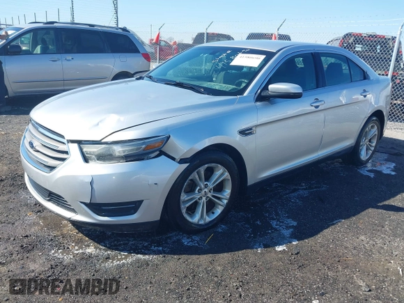 2013 Ford Taurus SEL with VIN 1FAHP2E8XDG164903, listed as a IAAI auction lot 41580690 with 163,128 mi miles and . Bid and sale history available at carsss.com. Image 17.