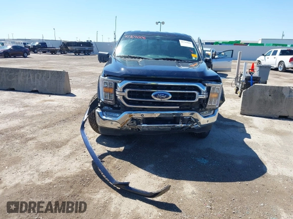 2022 Ford F-150 XL with VIN 1FTFW1E82NKD87353, listed as a IAAI auction lot 41769006 with 69,913 mi miles. Bid and sale history available at carsss.com. Image 12.