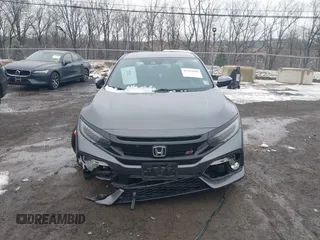 2020 Honda Civic Si with VIN 2HGFC1E55LH707320, listed as a IAAI auction lot 41569008 with 65,441 mi miles and . Bid and sale history available at DreamBid. Image 12.