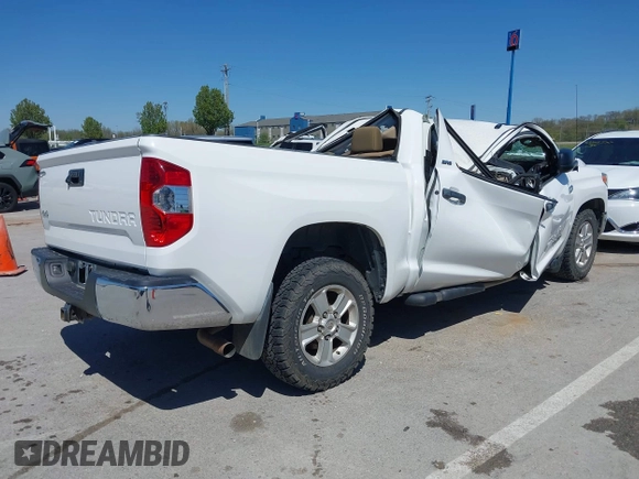 2014 Toyota Tundra 4WD Truck SR5 with VIN 5TFDW5F1XEX390763, listed as a IAAI auction lot 41973864 with 117,369 mi miles. Bid and sale history available at carsss.com. Image 4.