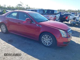 2012 Cadillac CTS Luxury with VIN 1G6DF5E51C0132662, listed as a IAAI auction lot 41710223 with 65,693 mi miles and . Bid and sale history available at DreamBid. Image 1.