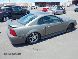 2002 Ford Mustang Standard with VIN 1FAFP40472F130413, listed as a IAAI auction lot 42432715 with 74,092 mi miles and . Bid and sale history available at DreamBid. Image 4.