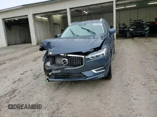 2021 Volvo XC60 Inscription с VIN YV4102DLXM1737403, выставлен на аукционе Copart как лот 84945084 с пробегом 19 900 миль миль и Списание • Salvage title. История ставок и продаж доступна на DreamBid. Изображение 14.