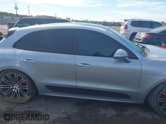 2015 Porsche Macan Turbo z VIN WP1AF2A5XFLB95717, wystawiony jako IAAI lot #41354991 z przebiegiem 122 663 mil mil oraz . Historia ofert i sprzedaży dostępna na DreamBid. Obrazek 13.