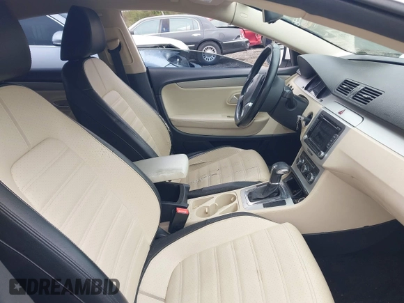 2010 Volkswagen CC Sport with VIN WVWML7AN5AE505256, listed as a IAAI auction lot 41870530 with 173,336 mi miles. Bid and sale history available at carsss.com. Image 5.