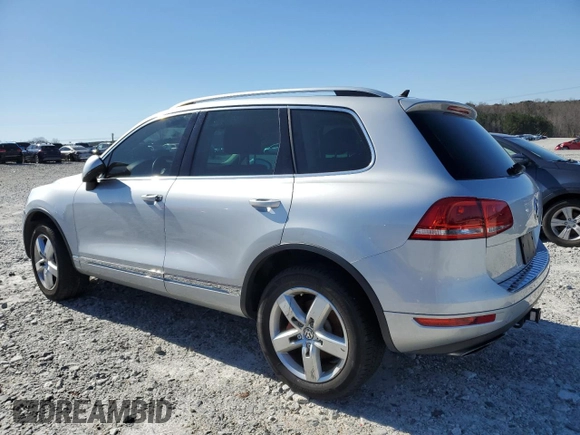 2011 Volkswagen Touareg Sport with VIN WVGFF9BPXBD000778, listed as a Copart auction lot 48529305 with 84,013 mi miles and Non Repairable. Bid and sale history available at DreamBid. Image 2.