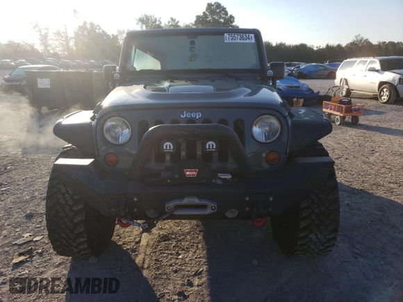 2013 Jeep Wrangler Unlimited Rubicon 10th Anniversary z VIN 1C4HJWFG0DL704100, wystawiony jako Copart lot #75573634 z przebiegiem 103 158 mil mil oraz Szkoda całkowita • Salvage title. Historia ofert i sprzedaży dostępna na DreamBid. Obrazek 5.