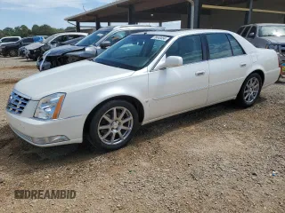 2008 Cadillac DTS 1SE z VIN 1G6KD57998U155183, wystawiony jako Copart lot #70440454 z przebiegiem 189 712 mil mil oraz Szkoda całkowita • Salvage title. Historia ofert i sprzedaży dostępna na DreamBid. Obrazek 1.