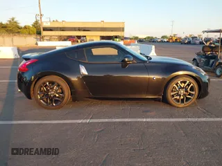 2015 Nissan 370Z Sport z VIN JN1AZ4EH5FM442339, wystawiony jako IAAI lot #42304030 z przebiegiem 73 272 mil mil oraz . Historia ofert i sprzedaży dostępna na DreamBid. Obrazek 13.