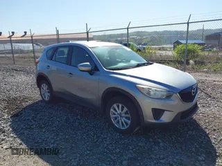 2013 Mazda CX-5 Sport with VIN JM3KE4BE0D0125748, listed as a IAAI auction lot 42143020 with 158,580 mi miles. Bid and sale history available at carsss.com. Image 1.